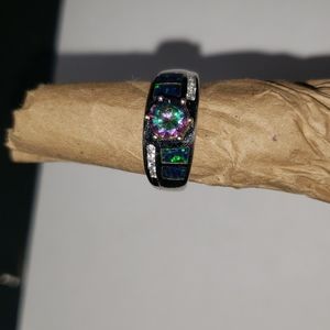 Silver ring with multi-colored crystals